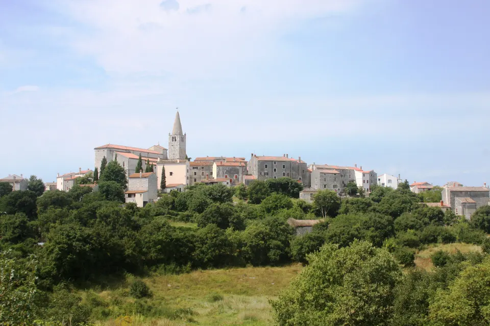 Bale seen from the east: inland villages are quieter, but local rules still apply.