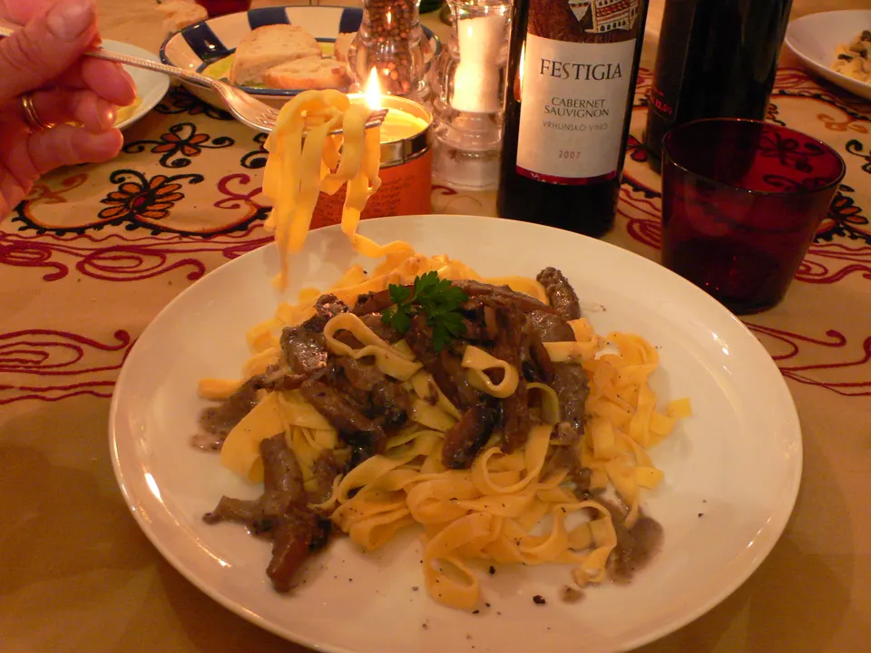 Fresh pasta, candlelight and a bottle of wine on an Istrian table.