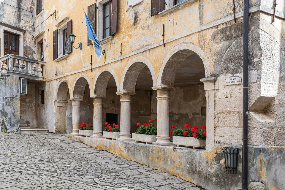 The arched loggia on the main square of Grožnjan, one of the town's concert spaces.