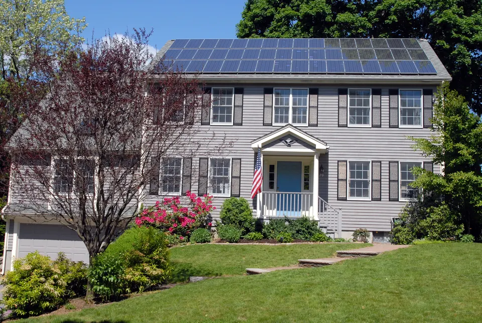 Solar panels across a house roof: placement on the roof is worth designing, not improvising.