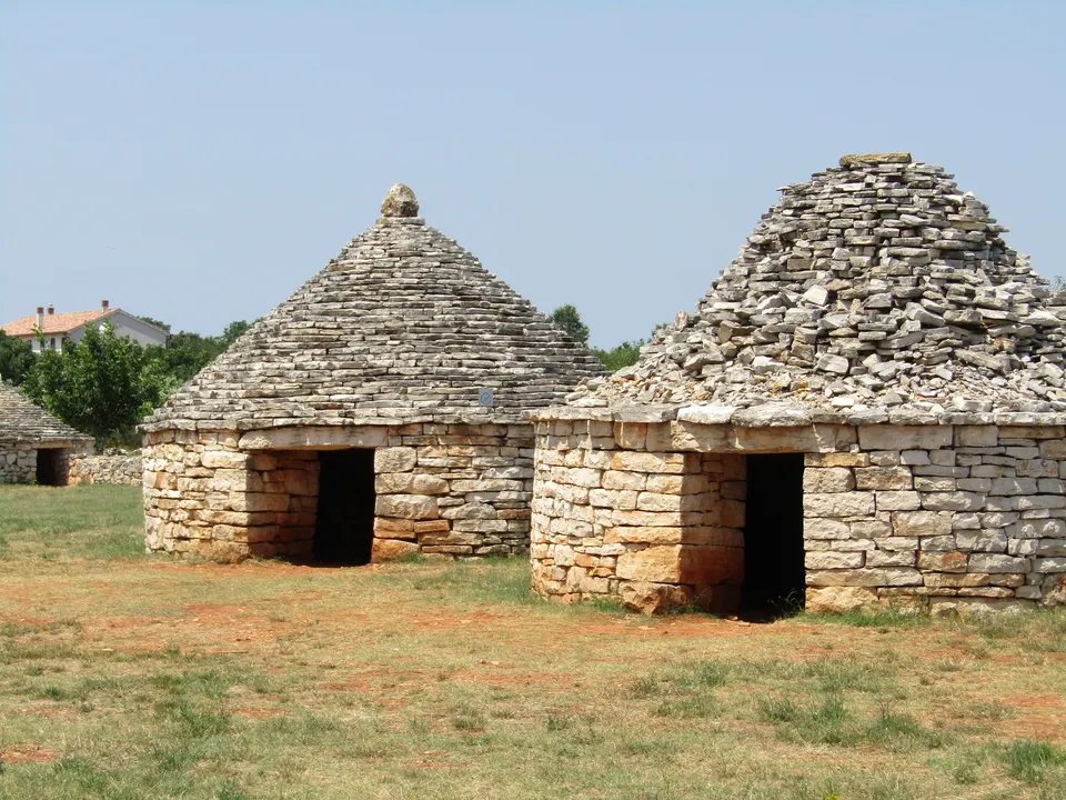 Kažun huts of dry stone in the open-air Kažun Park near Vodnjan.