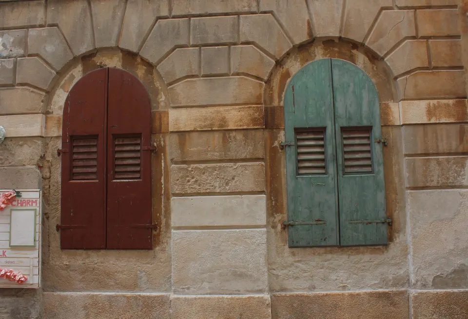 Colour in Istria is found in shutters and doors; the rest stays quiet.